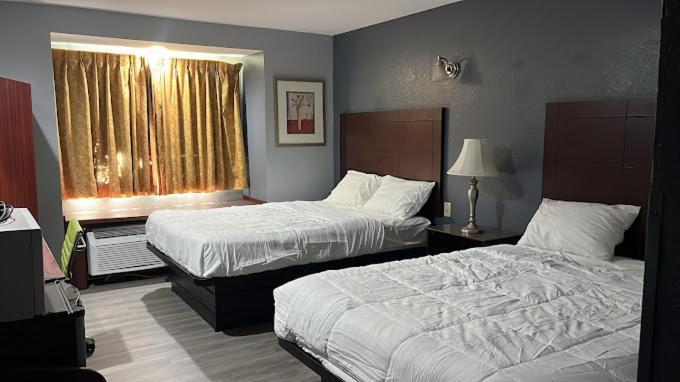 Blisspoint Inn & Suites, Northwood Exteriör bild