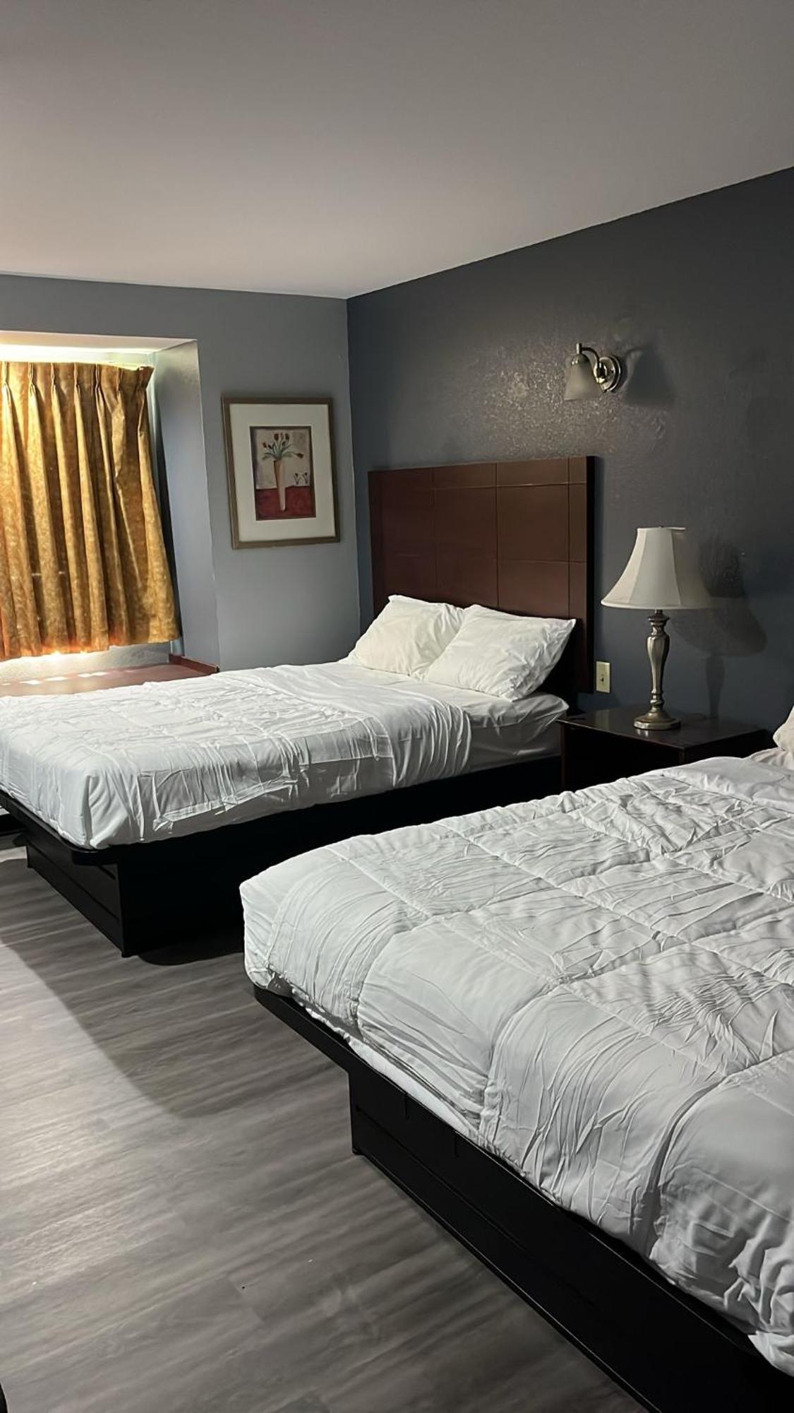 Blisspoint Inn & Suites, Northwood Exteriör bild